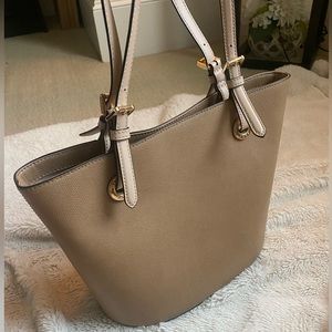 Michael Kors Camel tan with gold details gently used.